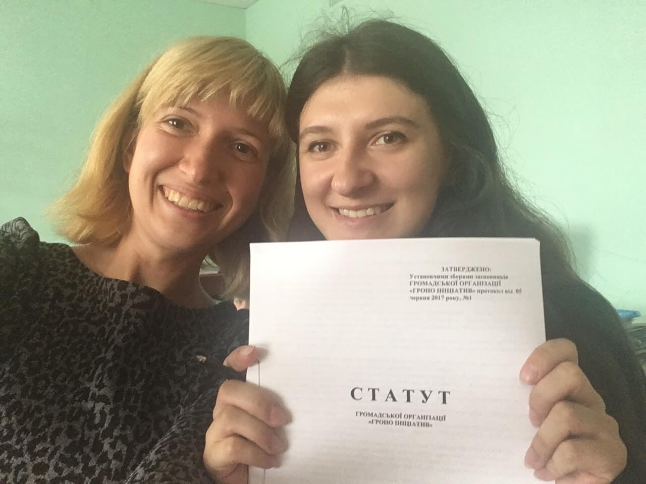 Photo of Oksana and Alina with the charter